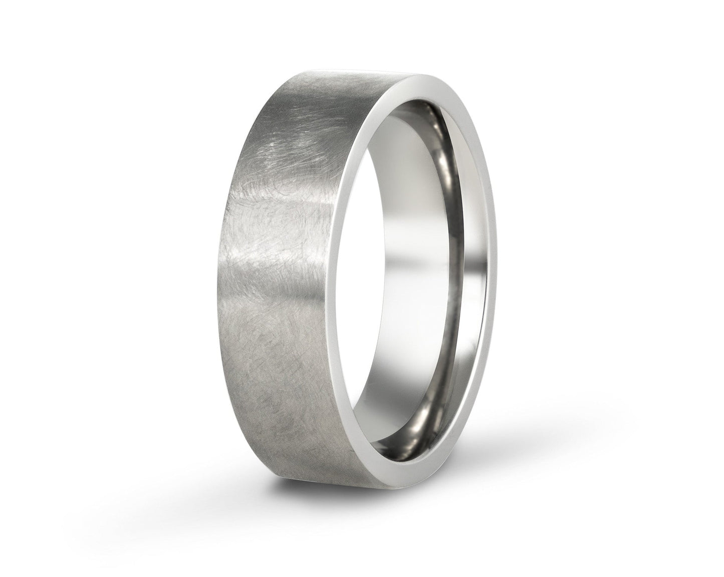 "Brüns" titanium ring with hand-etched finish on a white background