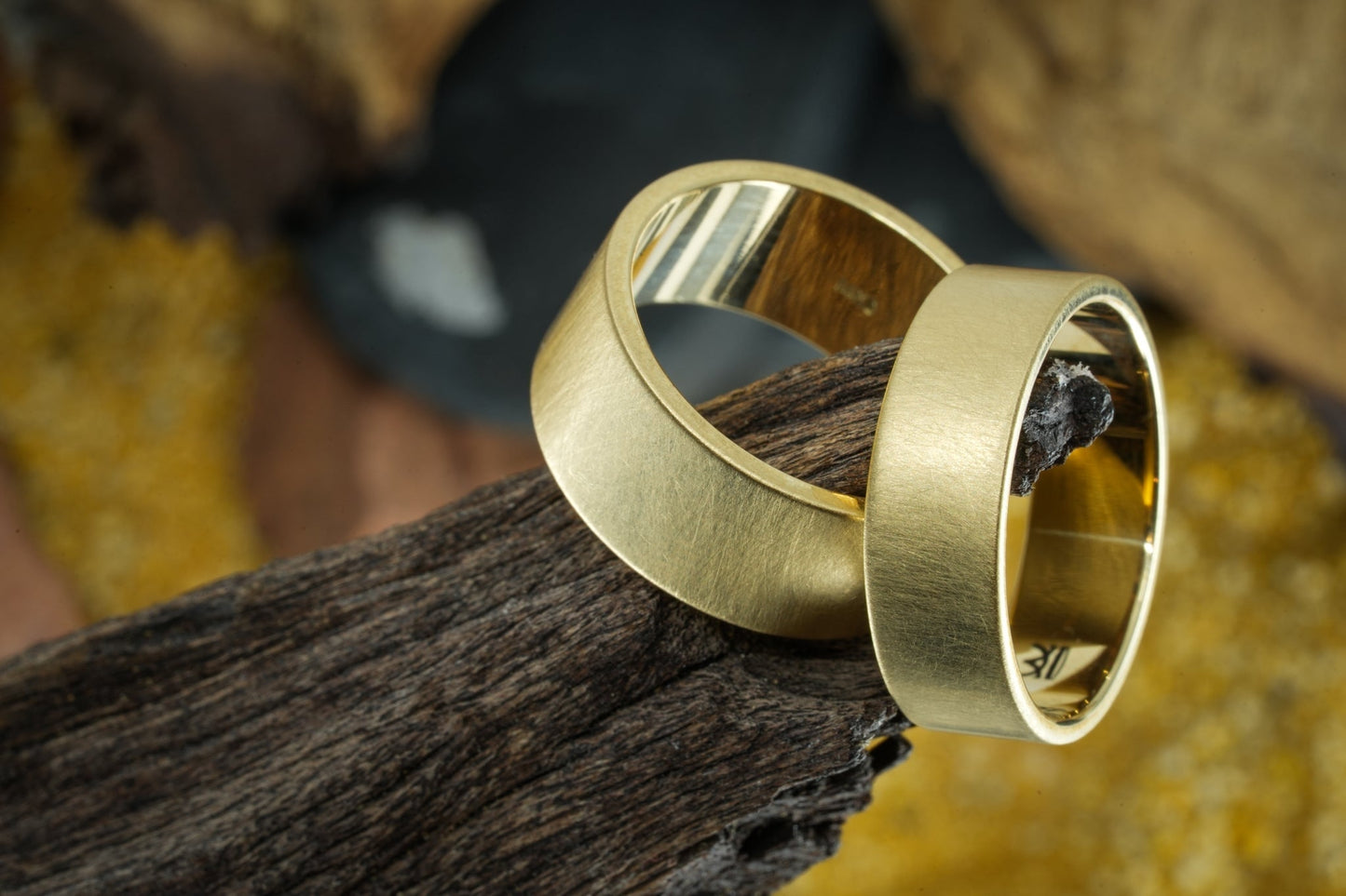 Etched "Kaler" 14k gold Rings wood display